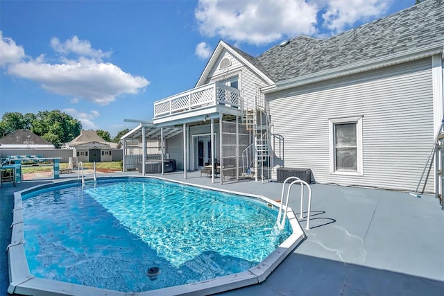 view of swimming pool featuring a patio