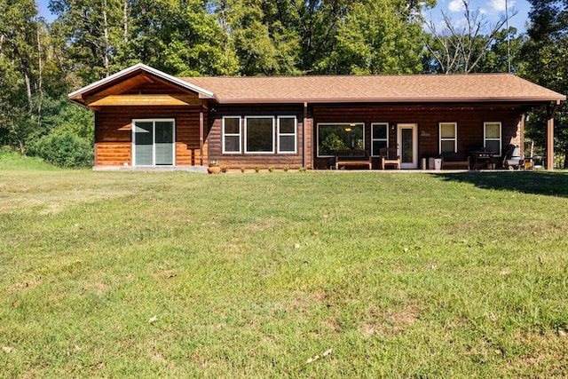 view of front of home featuring a front yard