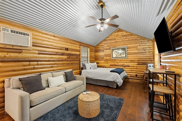 bedroom with dark hardwood / wood-style floors, ceiling fan, an AC wall unit, and rustic walls