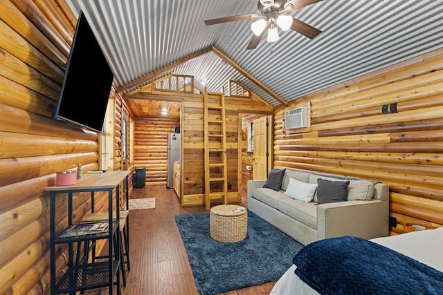 living room featuring vaulted ceiling, ceiling fan, log walls, an AC wall unit, and dark hardwood / wood-style floors