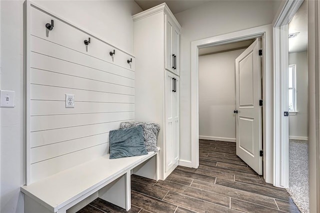 mudroom with dark hardwood / wood-style flooring