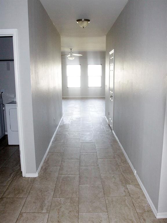 hallway featuring washer / dryer