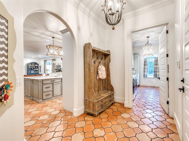 mudroom featuring crown molding