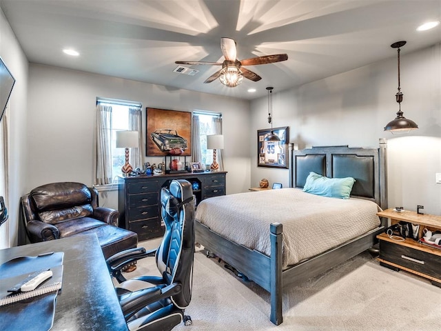 carpeted bedroom featuring ceiling fan