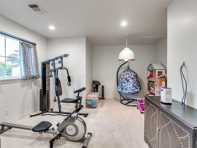 workout room featuring carpet floors