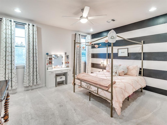 carpeted bedroom with ceiling fan