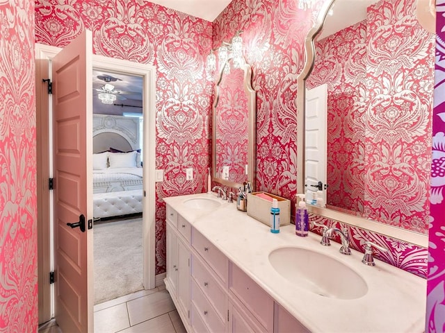 bathroom featuring tile patterned flooring and vanity