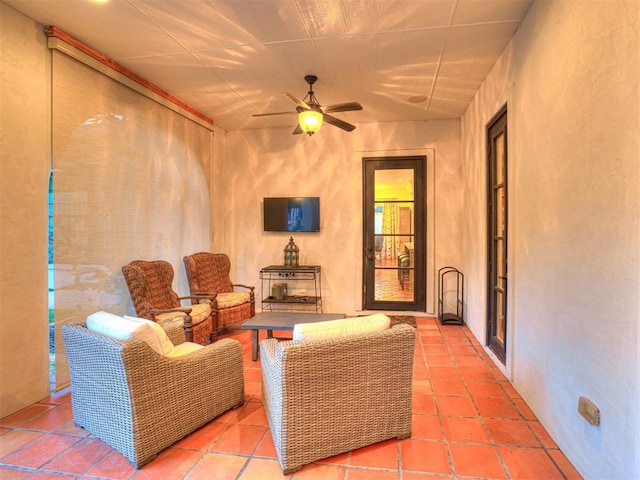 interior space featuring ceiling fan