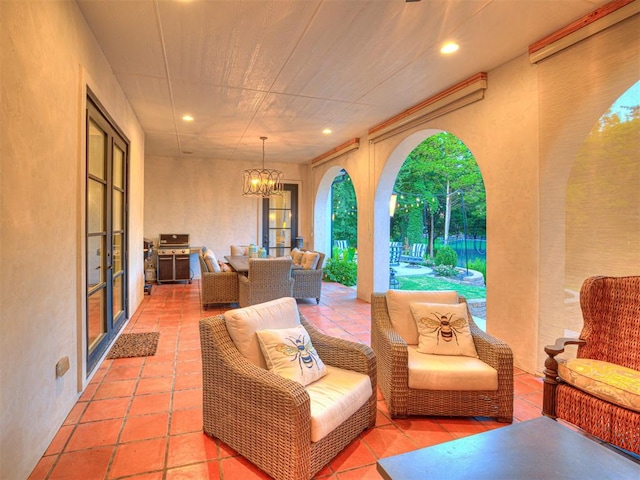 exterior space with grilling area and an outdoor hangout area