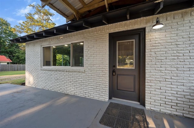 doorway to property featuring a patio