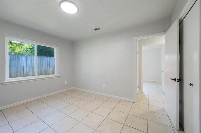 view of tiled spare room