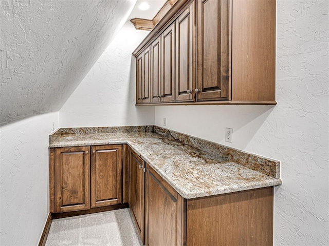 bar featuring light stone counters