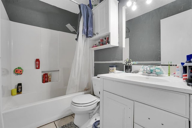 full bathroom featuring toilet, shower / bath combo, vanity, and tile patterned floors