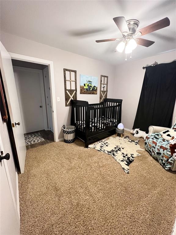 carpeted bedroom featuring ceiling fan