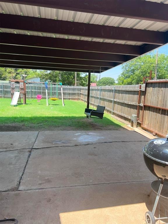 view of patio featuring a playground