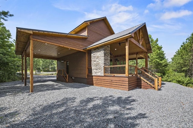 view of property exterior featuring a porch