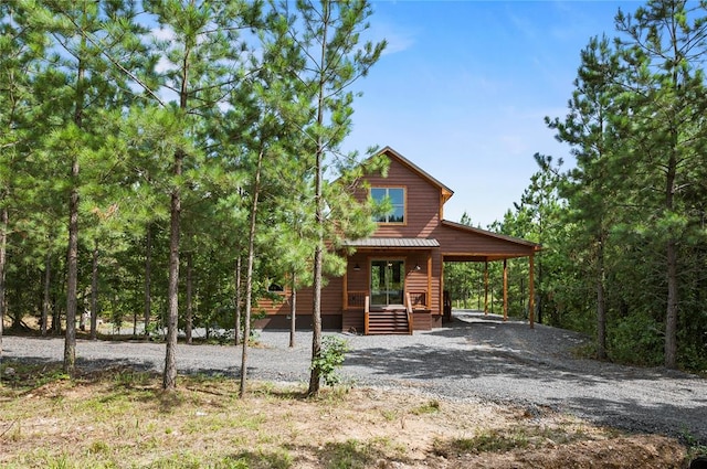 view of front of property with a carport