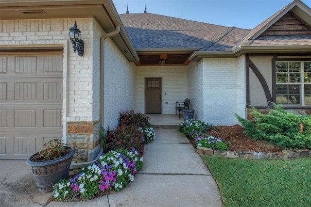 property entrance with a garage