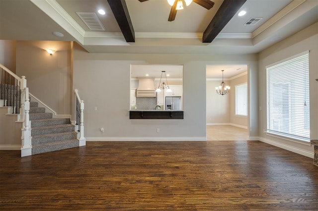 unfurnished living room featuring dark hardwood / wood-style flooring, ceiling fan with notable chandelier, crown molding, sink, and beam ceiling