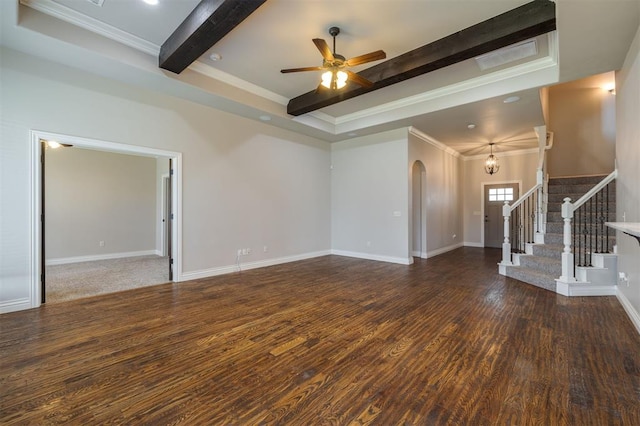 unfurnished living room featuring dark hardwood / wood-style flooring, ceiling fan with notable chandelier, and ornamental molding