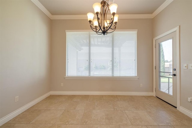 unfurnished dining area featuring plenty of natural light, crown molding, and a chandelier