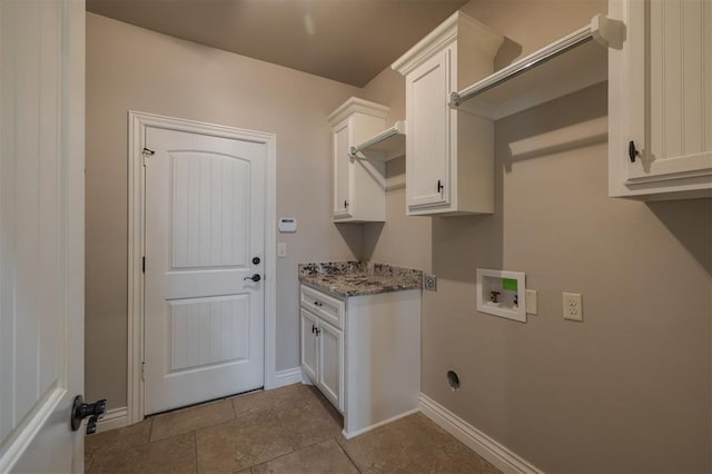 laundry area featuring hookup for an electric dryer, cabinets, and hookup for a washing machine