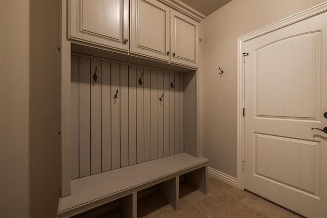 mudroom with light tile patterned floors