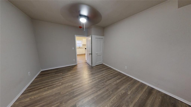 interior space featuring dark hardwood / wood-style floors and ceiling fan