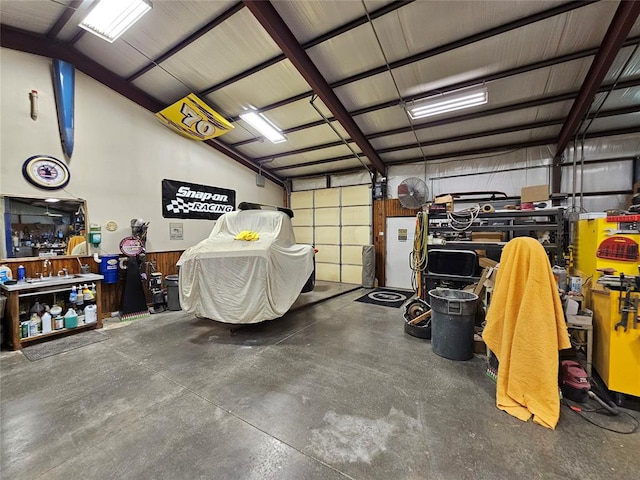 garage with a workshop area