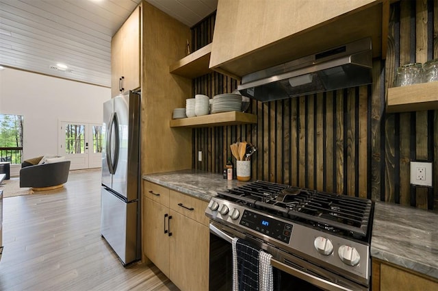 kitchen with appliances with stainless steel finishes, dark stone counters, wood ceiling, light hardwood / wood-style flooring, and range hood