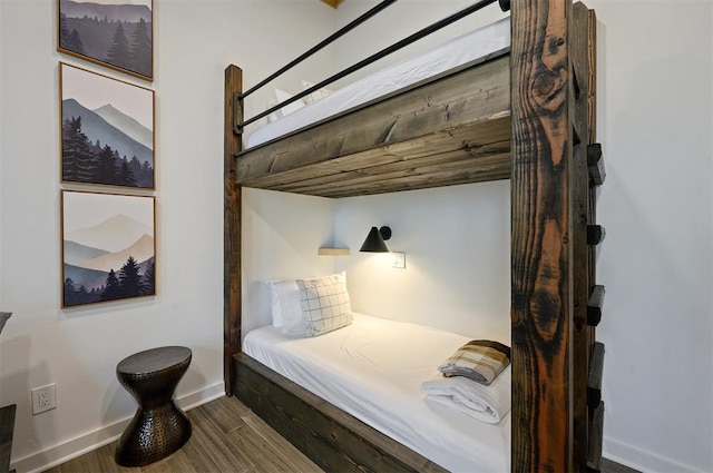 bedroom featuring hardwood / wood-style flooring