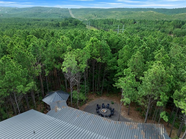 bird's eye view featuring a forest view