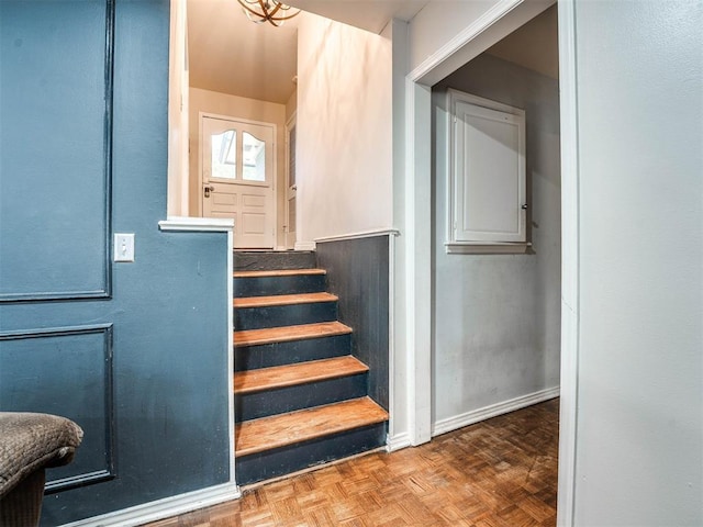 staircase with parquet floors