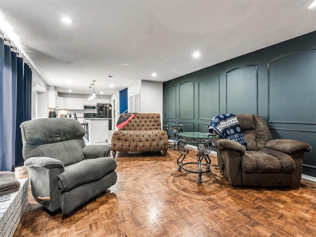 living room with parquet flooring