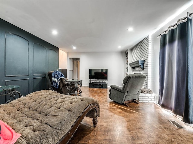 bedroom featuring parquet flooring