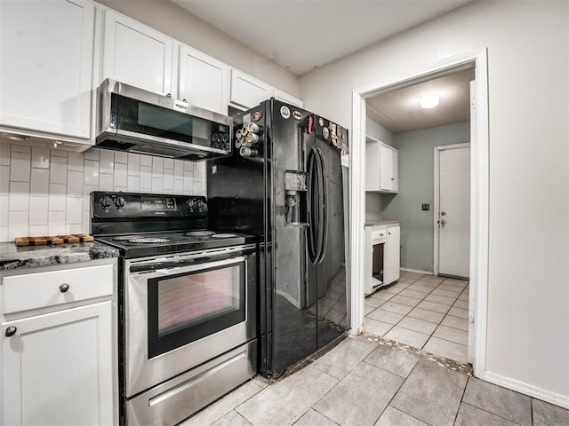 kitchen featuring decorative backsplash, white cabinetry, and stainless steel appliances