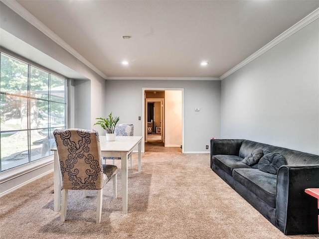 dining area featuring a wealth of natural light, crown molding, and light carpet