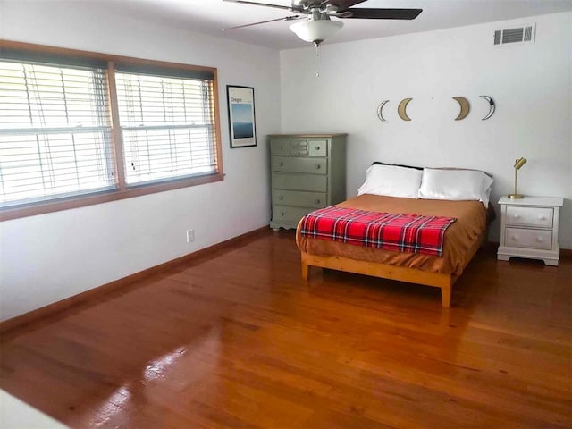 bedroom featuring ceiling fan and wood-type flooring