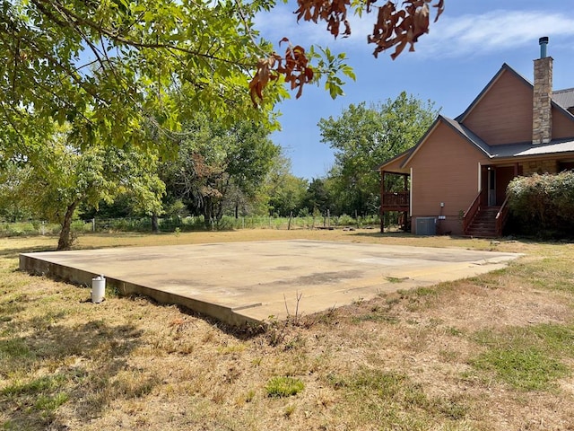 view of yard featuring central AC