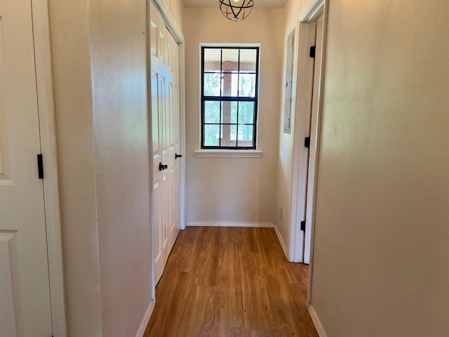 hallway with light wood-type flooring