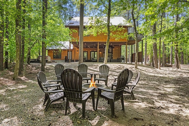 view of patio featuring an outdoor fire pit