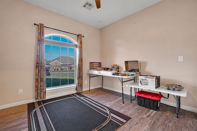 office space with ceiling fan and hardwood / wood-style flooring