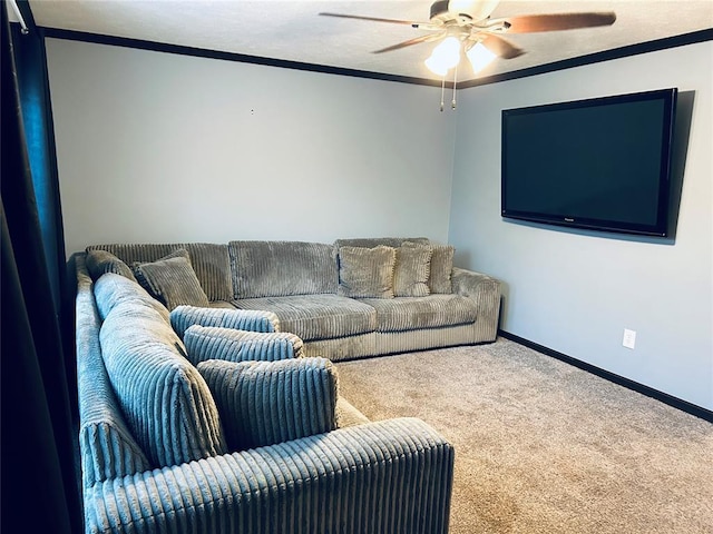 living room with carpet flooring, ceiling fan, and ornamental molding