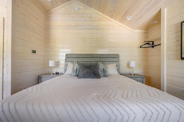 bedroom featuring wood walls, wooden ceiling, and vaulted ceiling