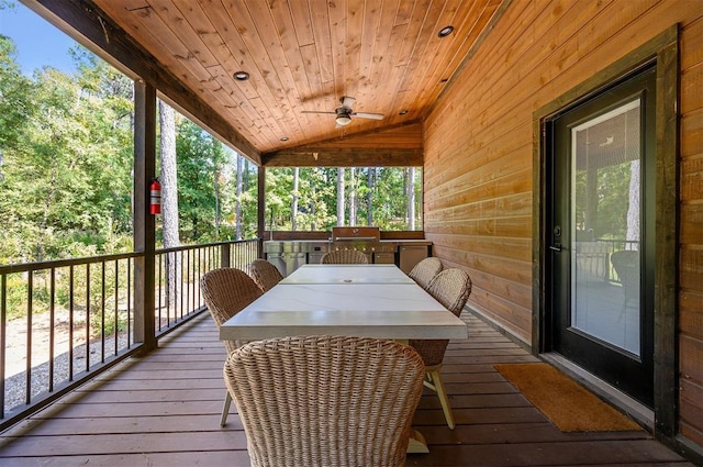 exterior space featuring ceiling fan and area for grilling