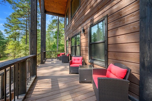 deck featuring outdoor lounge area