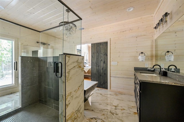 bathroom with vanity, separate shower and tub, and wooden walls