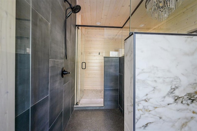 bathroom with tiled shower