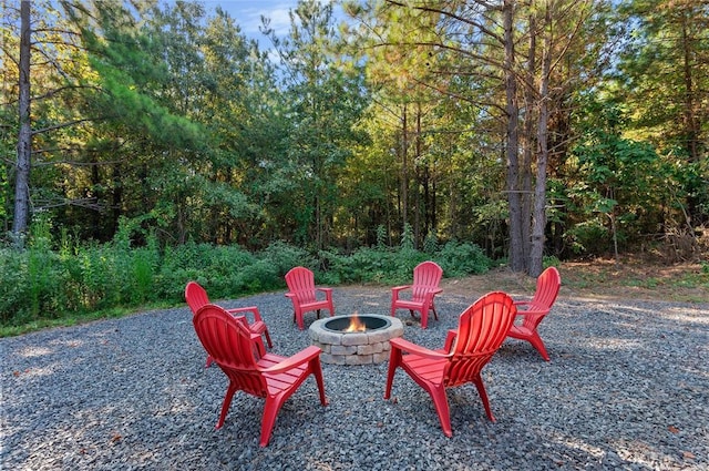 view of patio / terrace with a fire pit