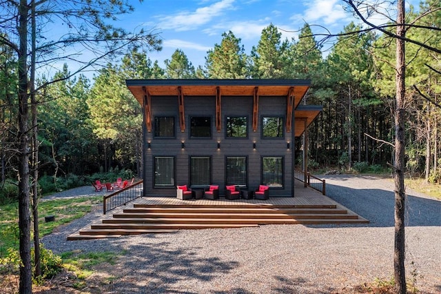 view of outbuilding with an outdoor hangout area